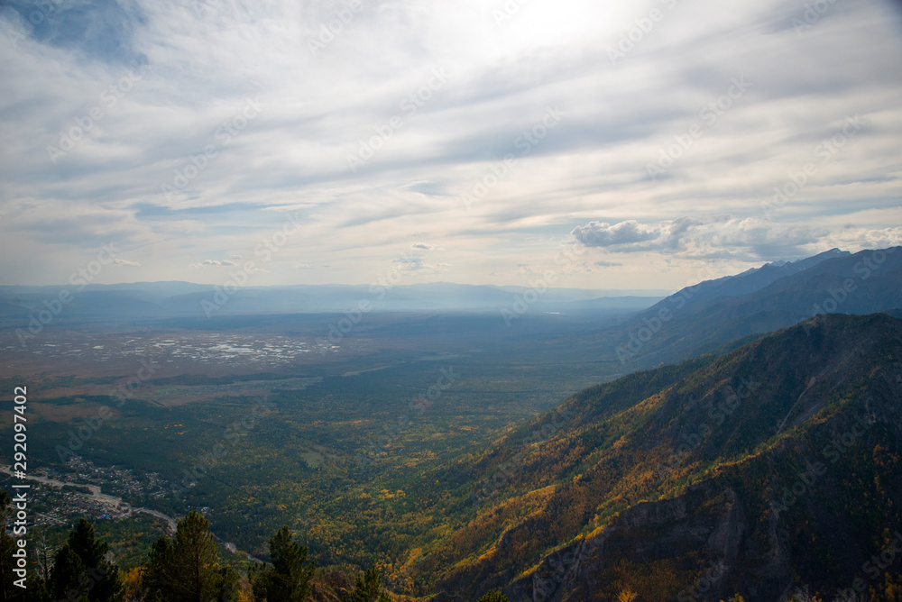 The mountain ranges of Satan and Hamar-Daban. Mountain peaks and valleys. Mountain landscape. The nature of Siberia. The mountain ranges of Satan and Hamar-Daban. Mountain peaks and valleys. Mountain landscape. The nature of Siberia.