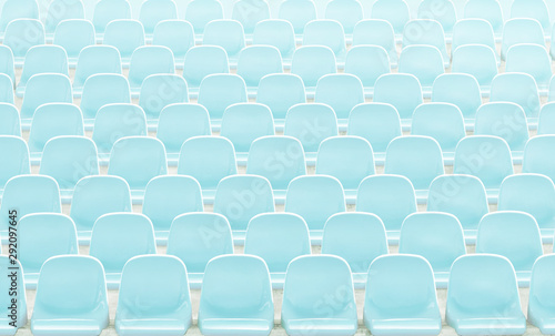 Light blue rows of seats on the stadium .