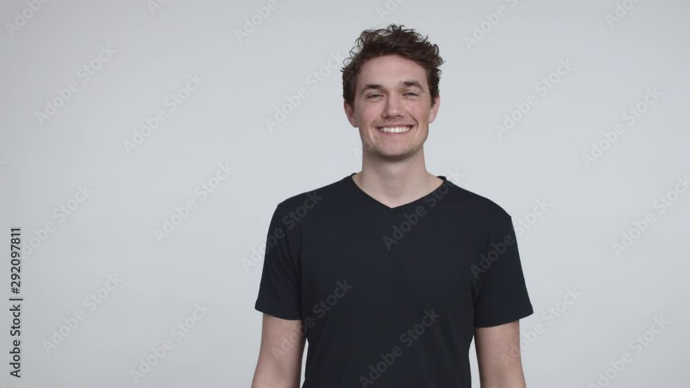 Handsome Male Model Walks in Frame and Smiles Handsome Male Model Walks in Frame and Smiles