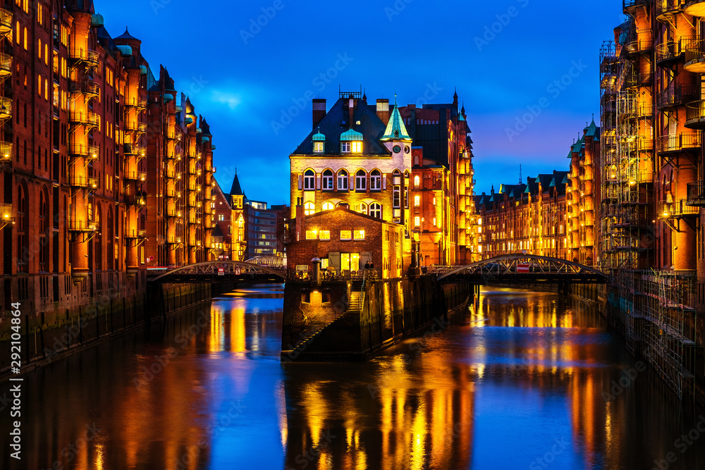 Night view of Speicherstadt in Hamburg, Germany. Illuminated historical buildings