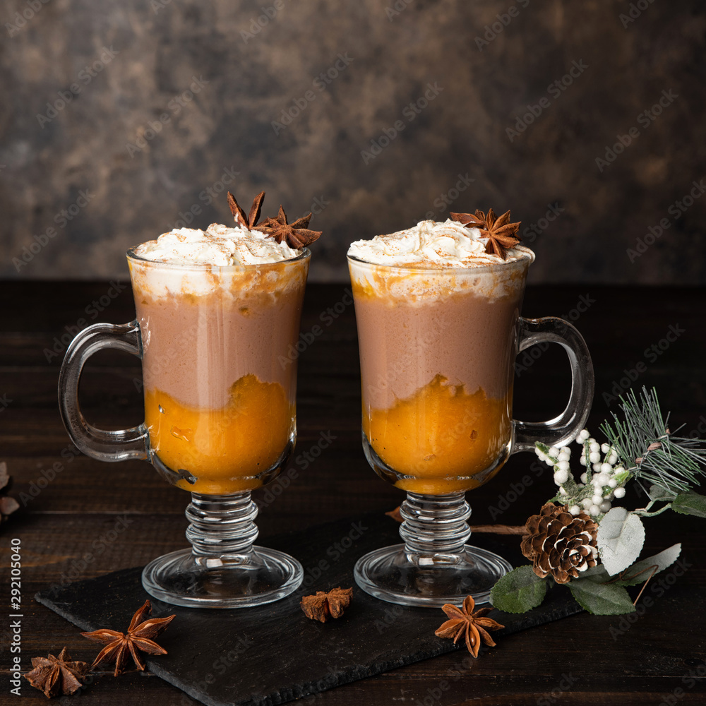 Pumpkin spice latte. Sweet chocolate hot drink with whipped cream Pumpkin spice latte. Sweet chocolate hot drink with whipped cream