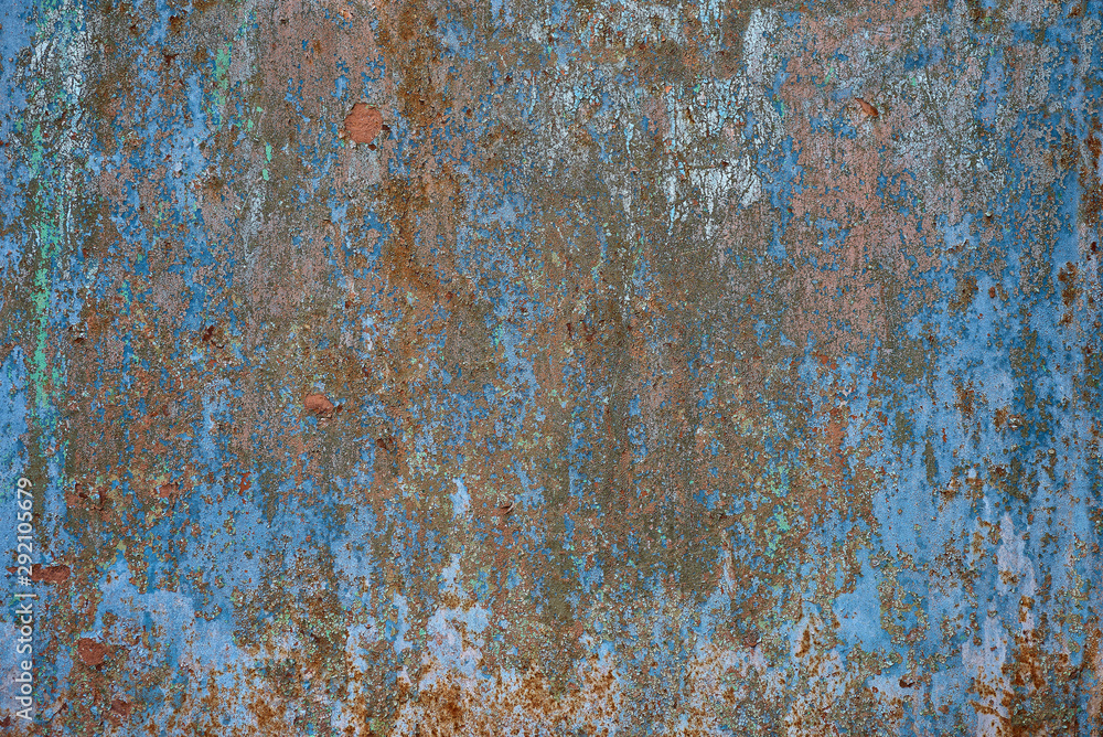 Old worn metal surface with paint. Rusty metal texture. Metal sheet with rust and worn paint. Background. Metal. Wall. Floor