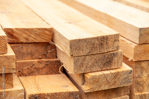 Fotografie Wooden boards for building a house as a background