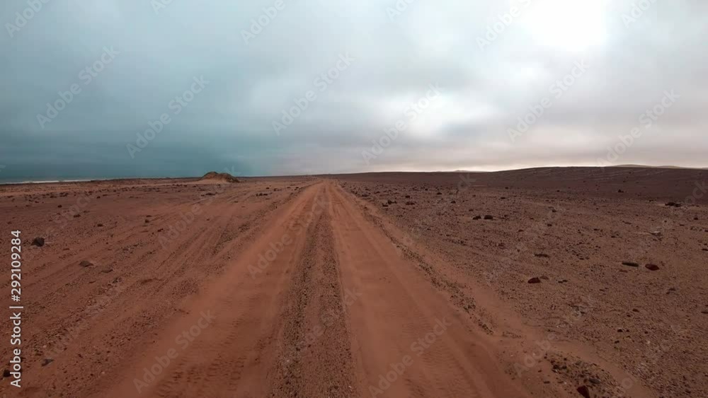 FPV of dune riding and 4x4 driving in sand dunes and on the beach. Shot in the Namibian Skeleton Coast, part of the Namib Desert FPV of dune riding and 4x4 driving in sand dunes and on the beach. Shot in the Namibian Skeleton Coast, part of the Namib Desert