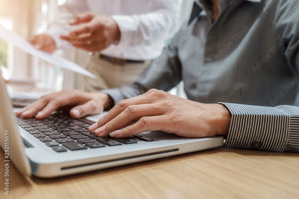 Business team brainstorming and discussing with financial data and report graph. Teamwork meeting working concept. Business team brainstorming and discussing with financial data and report graph. Teamwork meeting working concept.
