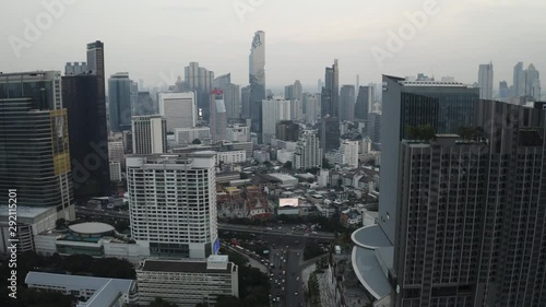 4K Aerial Drone Cityscape of Downtown Bangkok Thailand Shot over busy traffic in Samyan. photo