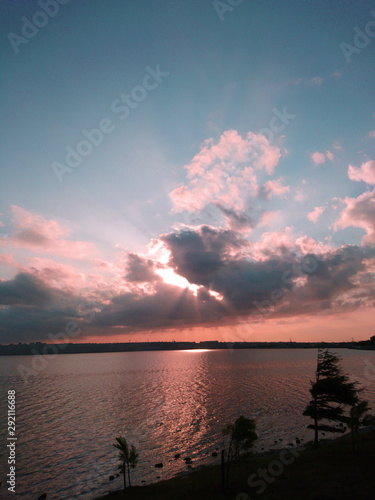 Fototapeta Naklejka Na Ścianę i Meble -  sunsine through cloudy sky above lake Kucukcekmece in Istanbul