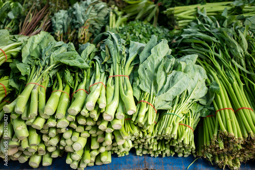 Chinese kale and other vegetables on stall in fresh market