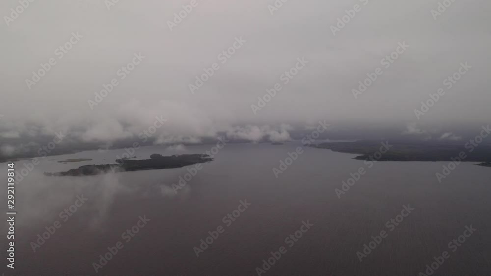 Clouds above the ground aerial shot. Clouds over the water. Clouds above the ground aerial shot. Clouds over the water.