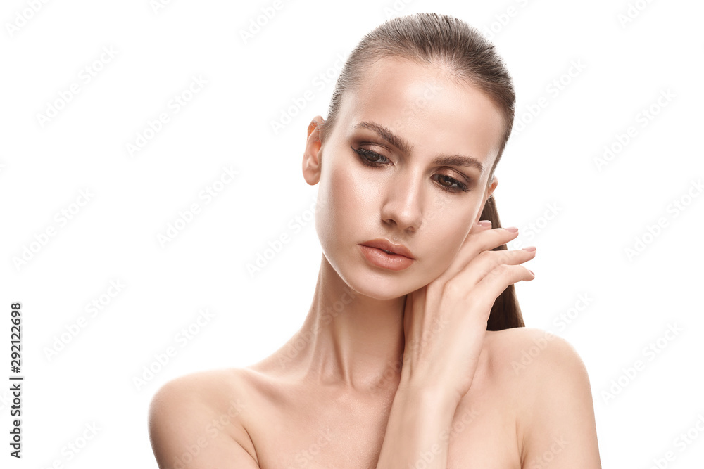 Beautiful face of young brunette woman with clean fresh skin - isolated on white Beautiful face of young brunette woman with clean fresh skin - isolated on white