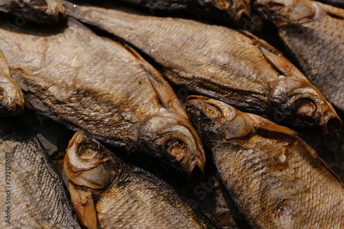 conceptual flat background of dried fish. vobla
