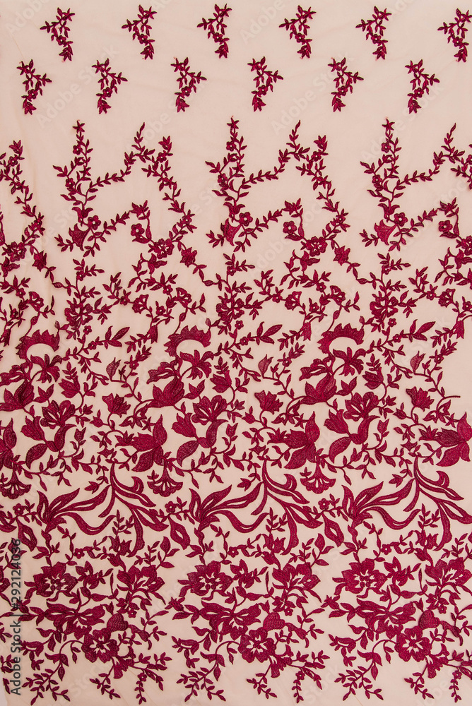 Texture lace fabric. lace on white background studio. thin fabric made of yarn or thread. a background image of ivory-colored lace cloth. White lace on beige background. Texture lace fabric. lace on white background studio. thin fabric made of yarn or thread. a background image of ivory-colored lace cloth. White lace on beige background.
