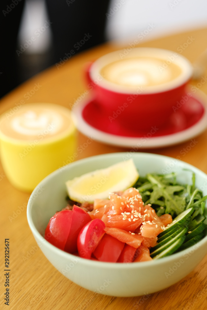 healthy breakfast in the cafe. poke and coffee healthy breakfast in the cafe. poke and coffee