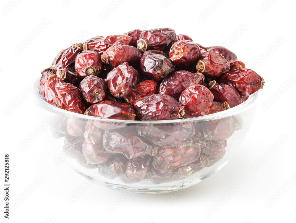 Dried wild rose berries in glass bowl isolated on white background with clipping path Dried wild rose berries in glass bowl isolated on white background with clipping path