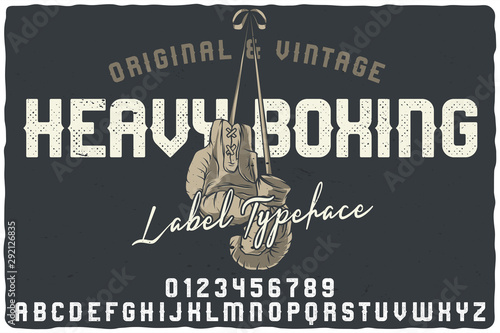 Vintage label font named Heavy Boxing. Letters and numbers set. Label with illustration and text composition.