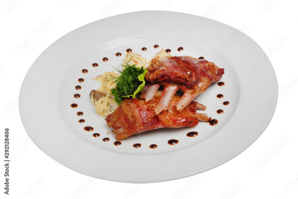 Fried rib steak with green on plate on white isolated background Fried rib steak with green on plate on white isolated background