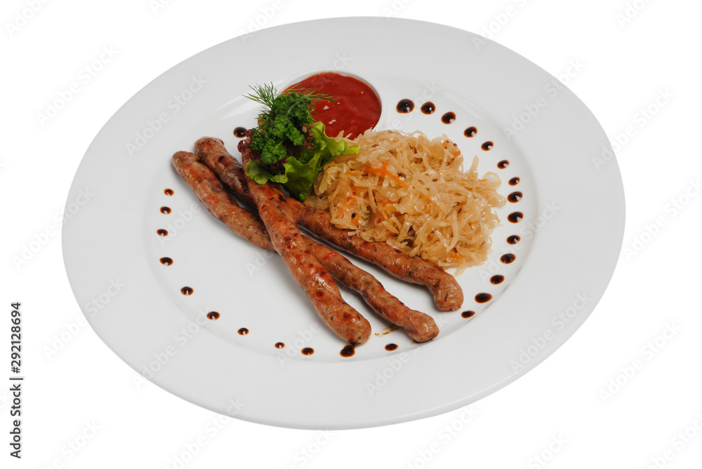 Raw pork sausages closeup view. Hunting grilled sausages and stewed cabbage on a plate isolated on white background