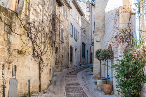 Fototapeta Naklejka Na Ścianę i Meble -  Streets and typical buildings of Uzes at the Department of Gard, France
