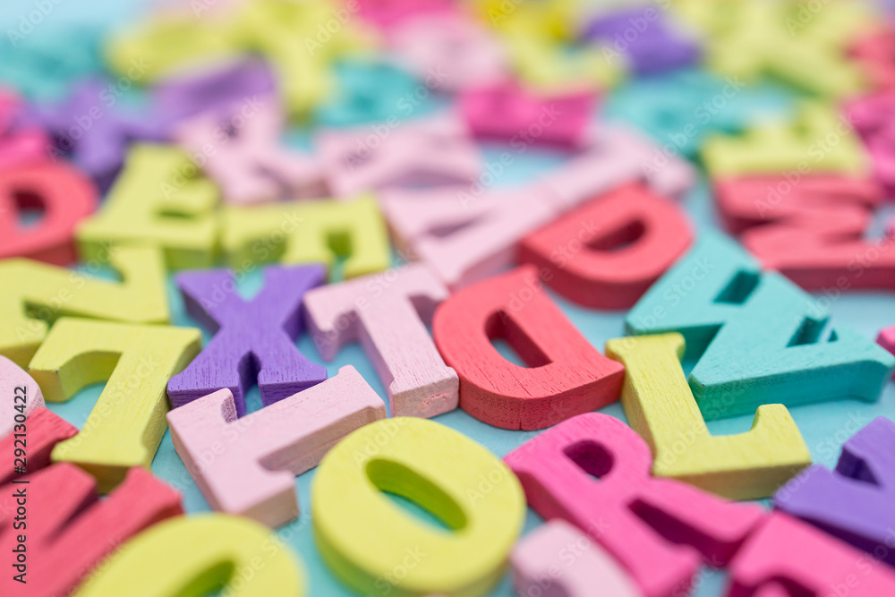 Alphabet wooden letters abstract on color background Alphabet wooden letters abstract on color background