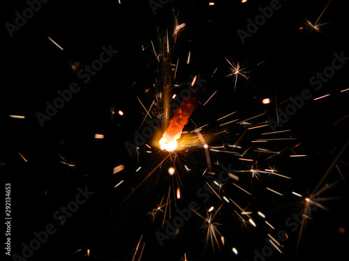 Wallpaper Mural sparkler isolated on black background Torontodigital.ca