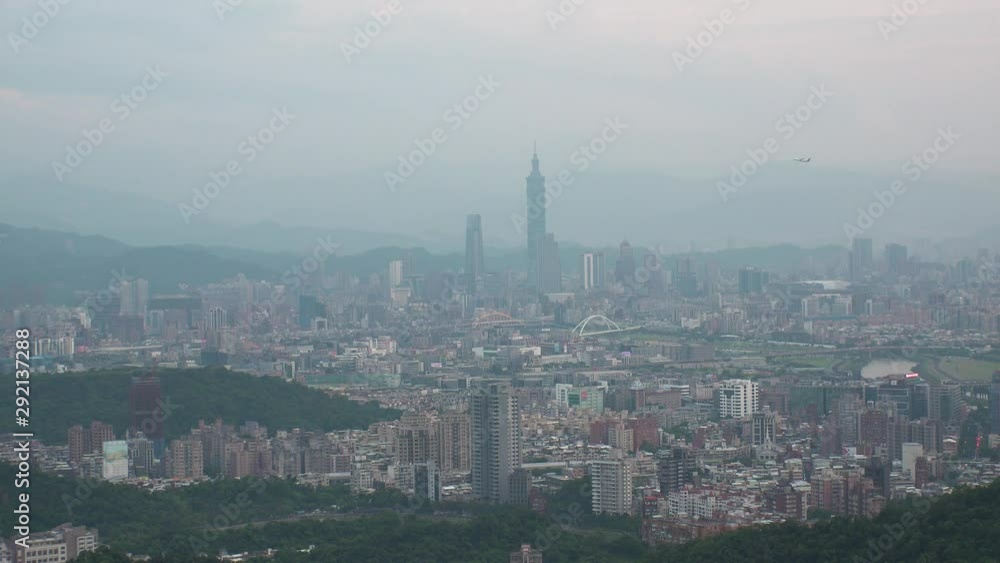 TAIPEI, TAIWAN - CIRCA AUGUST 2019 : Aerial view of cityscape of Taipei at sunset time. View around shopping and business district at Xinyi area. TAIPEI, TAIWAN - CIRCA AUGUST 2019 : Aerial view of cityscape of Taipei at sunset time. View around shopping and business district at Xinyi area.