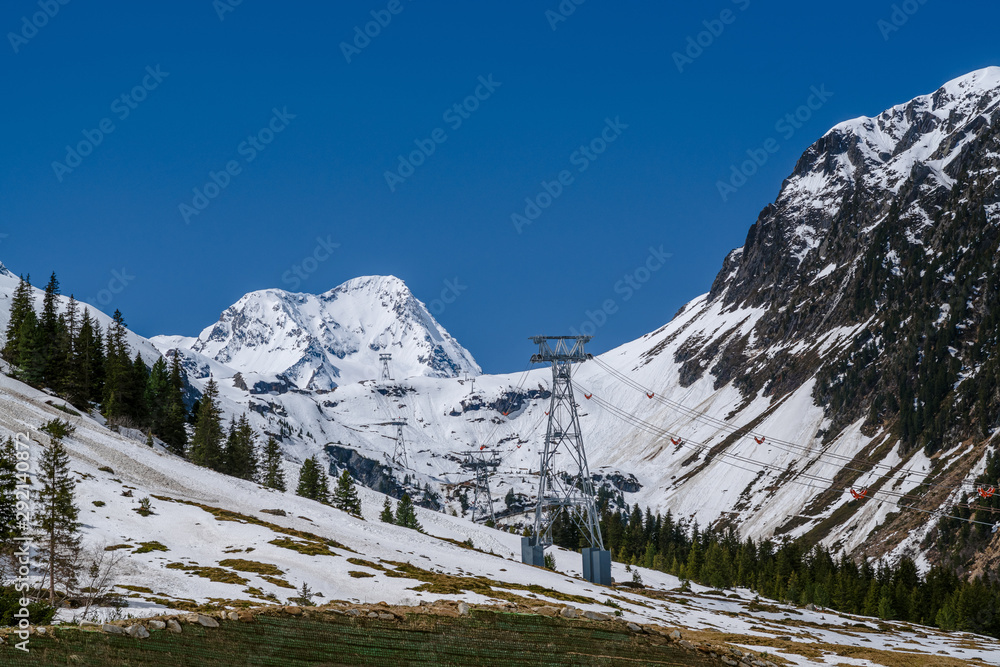 Beautiful day of mountain cover by snow and blue sky at Stubai Gletscher ski area, a famous spot for ski in spring and winter.