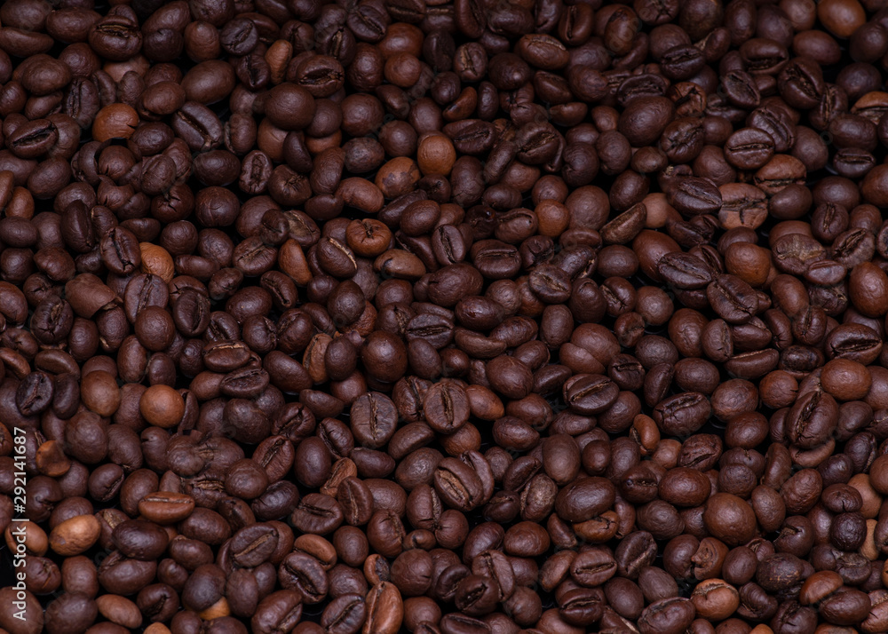coffee beans on burlap background coffee beans on burlap background