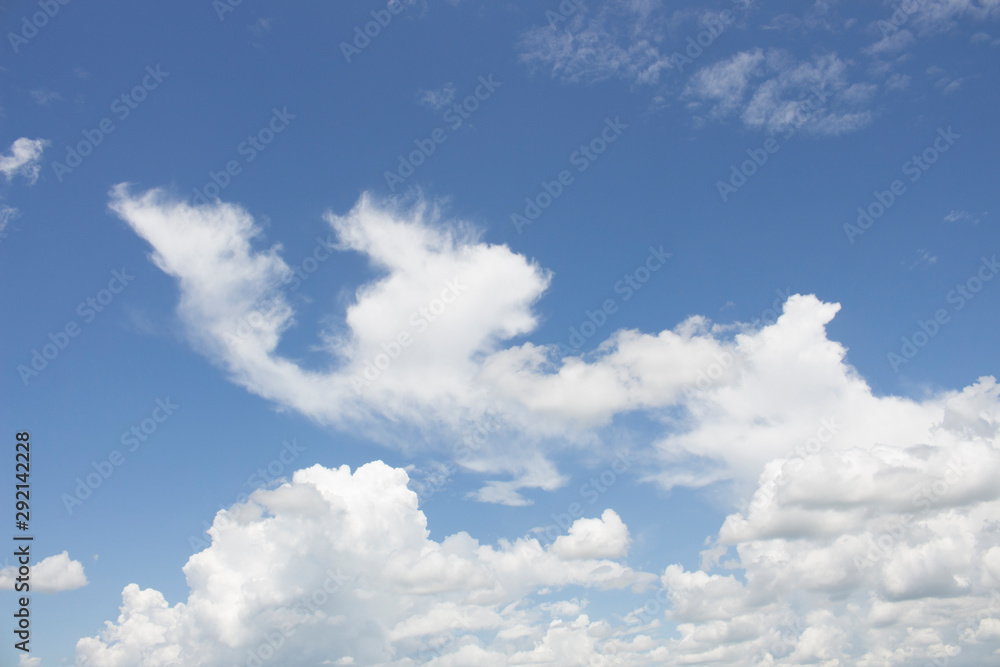 Fototapeta premium Bright blue sky with white clouds for background or wallpapers