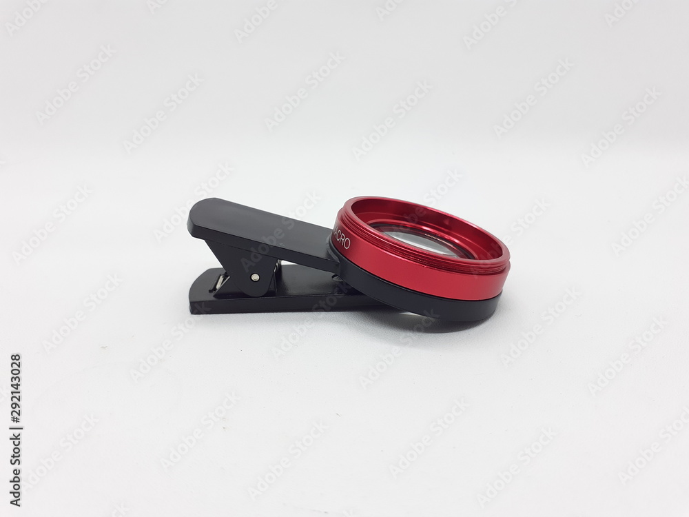 Luxury Red Metallic Selfie Lens with Macro Fish Eye Technology for Phone Camera Accessories in White Isolated Background Luxury Red Metallic Selfie Lens with Macro Fish Eye Technology for Phone Camera Accessories in White Isolated Background