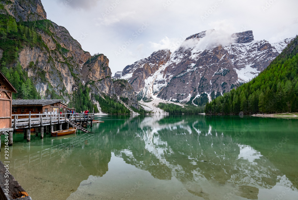 Breathtaking view of Braies lake in Dolomites, Italy. A turquoise lake with background of mountains of alps.