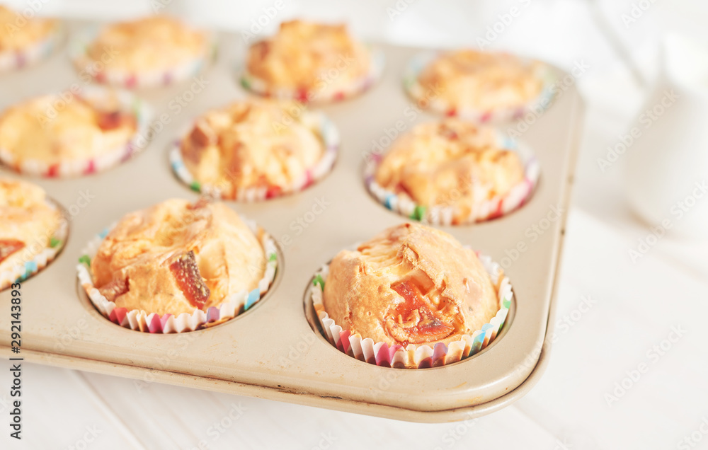 ham and cheese muffins on white wooden background