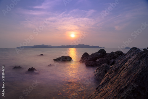 Beautiful sunset during twighlight time with clouds,Blue sky and mountain around the sea at sattahip,pattaya,chonburi,Thailand,copy space and background,attraction tourist in chonburi.