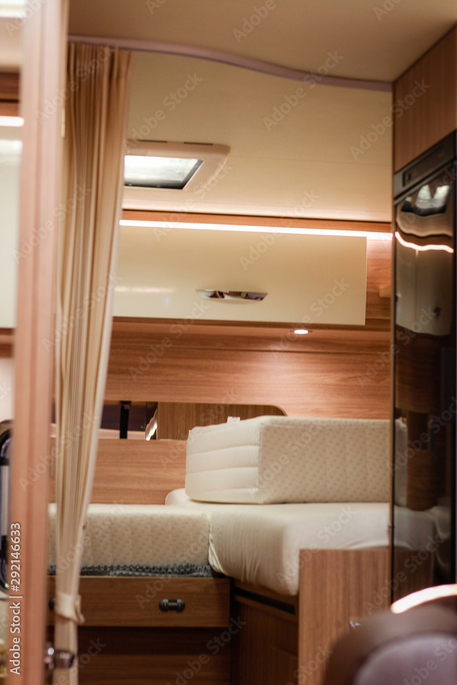 House on wheels. Caravan. Details. Kitchen and utensils. Bedroom and beds. Driver's seat.Campervan.Camper inside House on wheels. Caravan. Details. Kitchen and utensils. Bedroom and beds. Driver's seat.Campervan.Camper inside