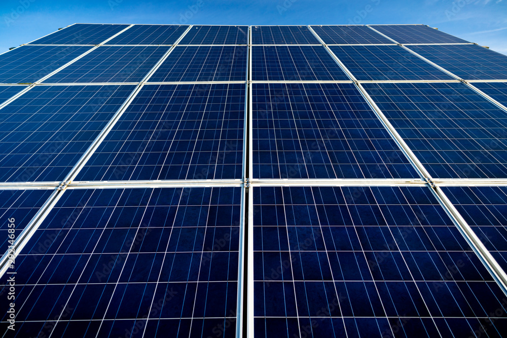 Commercial solar panel close up showing the cell detail Commercial solar panel close up showing the cell detail