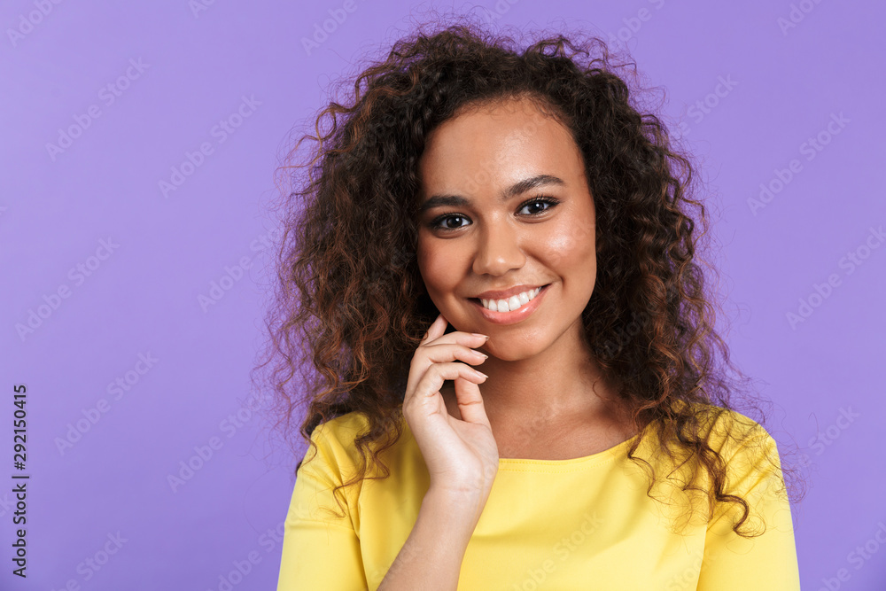 Image of gorgeous african american woman posing at camera with smile Image of gorgeous african american woman posing at camera with smile