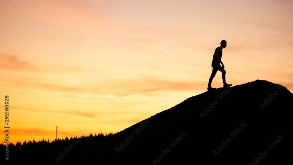 silhouette of a man in the sunset