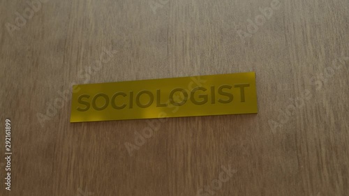 golden door sign Sociologist. enter to room photo