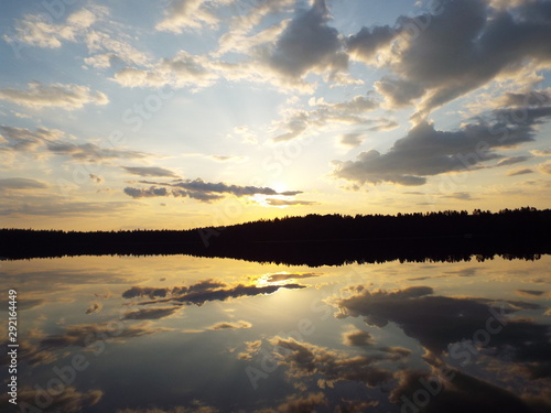 sunset over a quiet lake