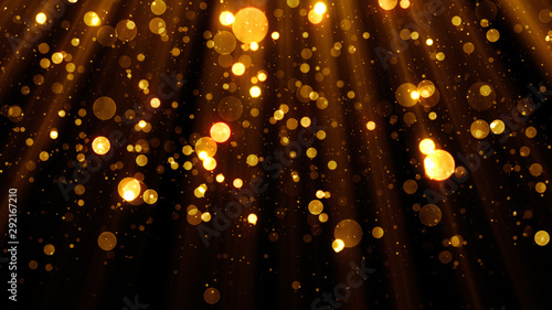Glitter celebration texture with golden particles. Abstract background with magic lights and sparks.