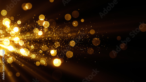 Glitter celebration texture. Golden stream with particles. Abstract background with magic lights and sparks.  photo