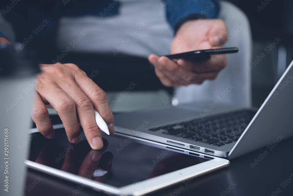 Multitasking business man working at home