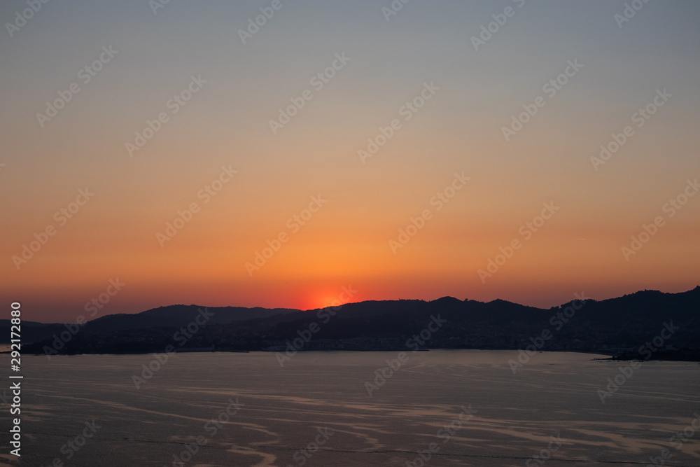 Sunset at the mouth of the Vigo River. July - 2019, Vigo, Galicia, Spain.