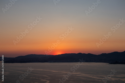 Sunset at the mouth of the Vigo River. July - 2019, Vigo, Galicia, Spain.