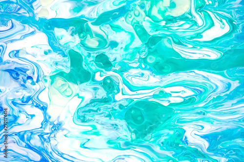 Acrylic paint . Abstract art background, fluid acrylic painting on canvas. Backdrop blue color for your design .