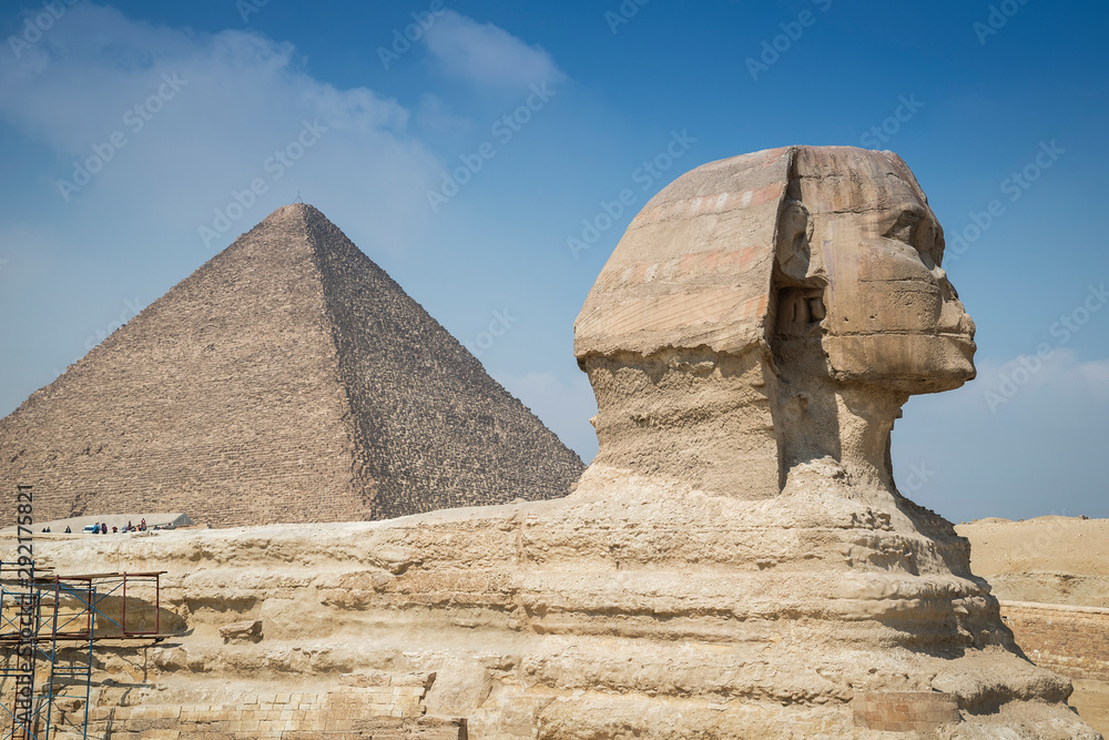 The great Sphinx and the nearby great pyramid at Giza Plateau, Cairo, Egypt The great Sphinx and the nearby great pyramid at Giza Plateau, Cairo, Egypt