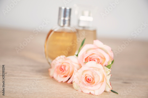perfume with pink roses