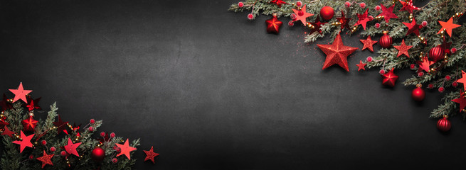 Christmas Decoration With Fir Branches And Red Stars