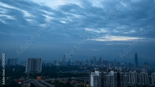 Beautiful time lapse motion, aerial view of Kuala Lumpur city in evening scene, traffic and city light at night. 