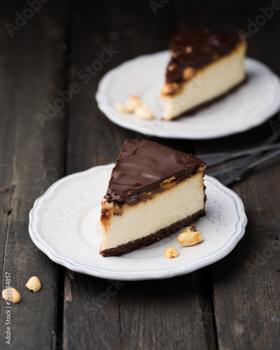 A classic creamy cheesecake with a chocolate base, roasted peanuts, salted caramel and chocolate - a favorite popular chocolate sweet