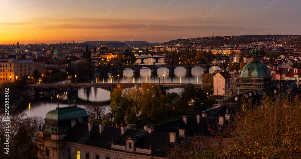 Panorama, dawn over the city of Prague, Czech Republic, aerial view on Manes Bridges, Charles Bridge and Legion Bridge. Morning mood concept.